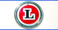 L Ausstattung:  Abschliessbarer Tankverschluss, Stossstangenhörner mit Gummipuffern, Seitenzierblenden, Auspuffblende, "L"-Schriftzug.